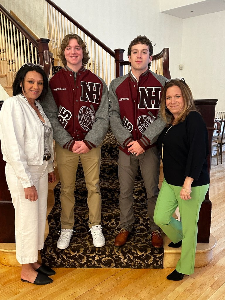 The founders of Hugs From Home with their sons